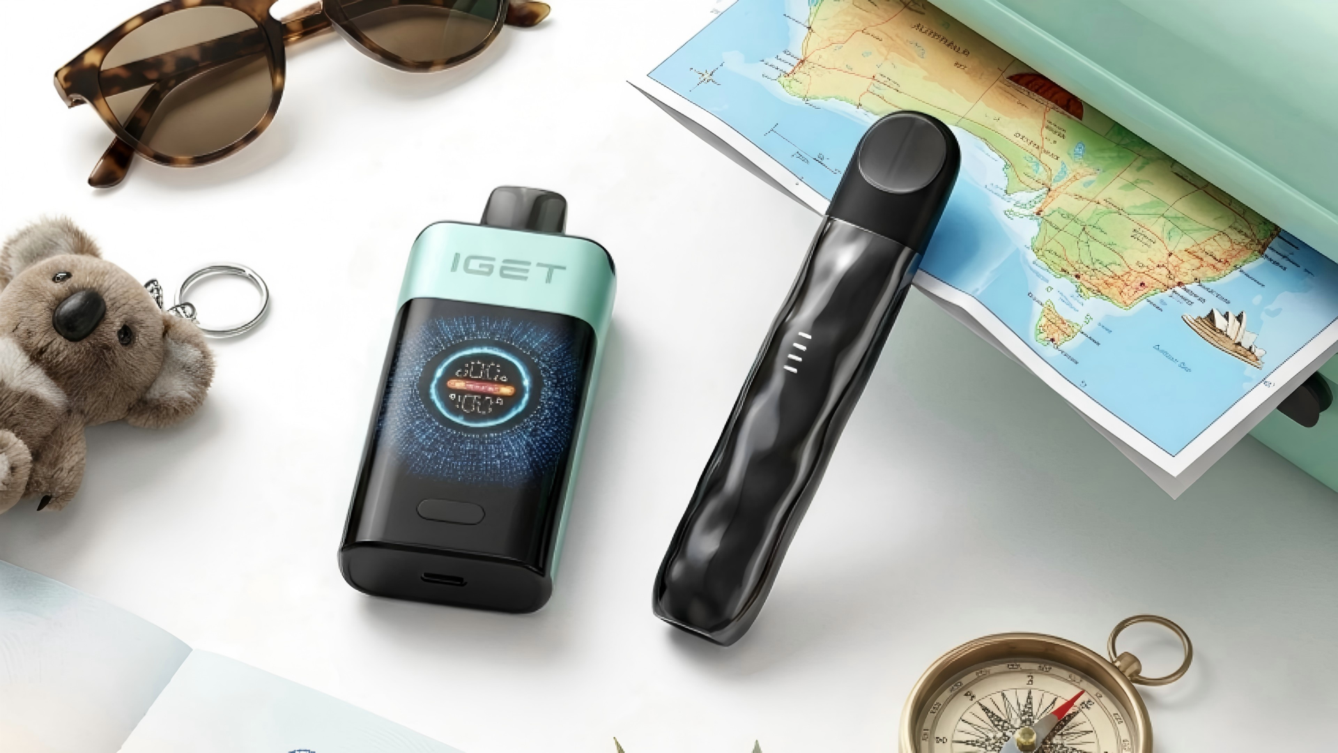 Travel vape setup Australia 2026 showing iGET One disposable and RELX pod system with suitcase and map